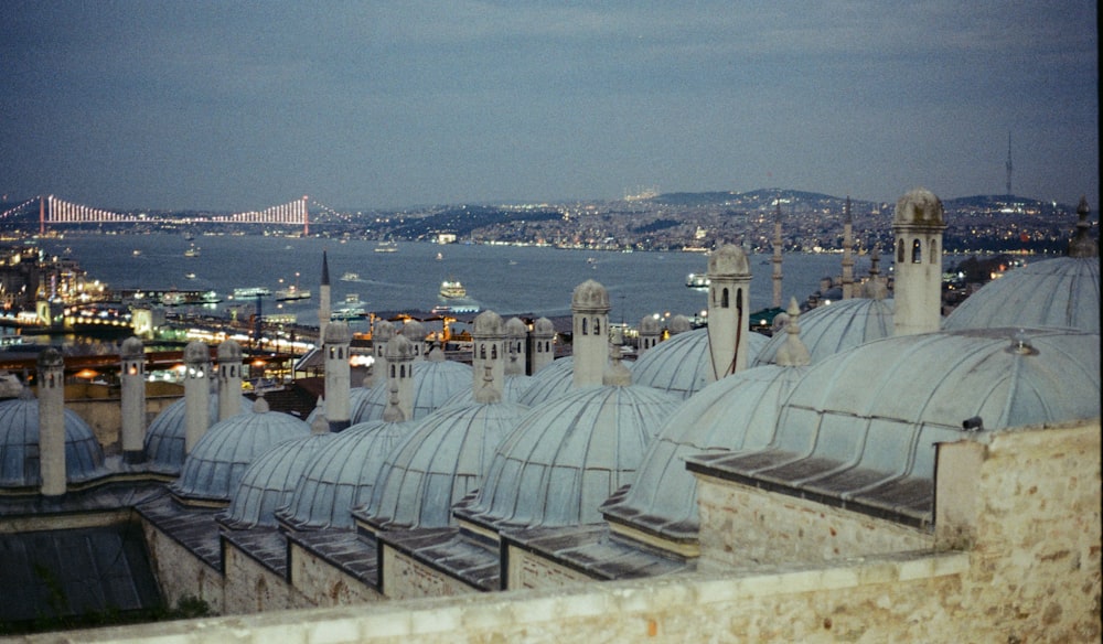 a view of a city with a bridge in the background