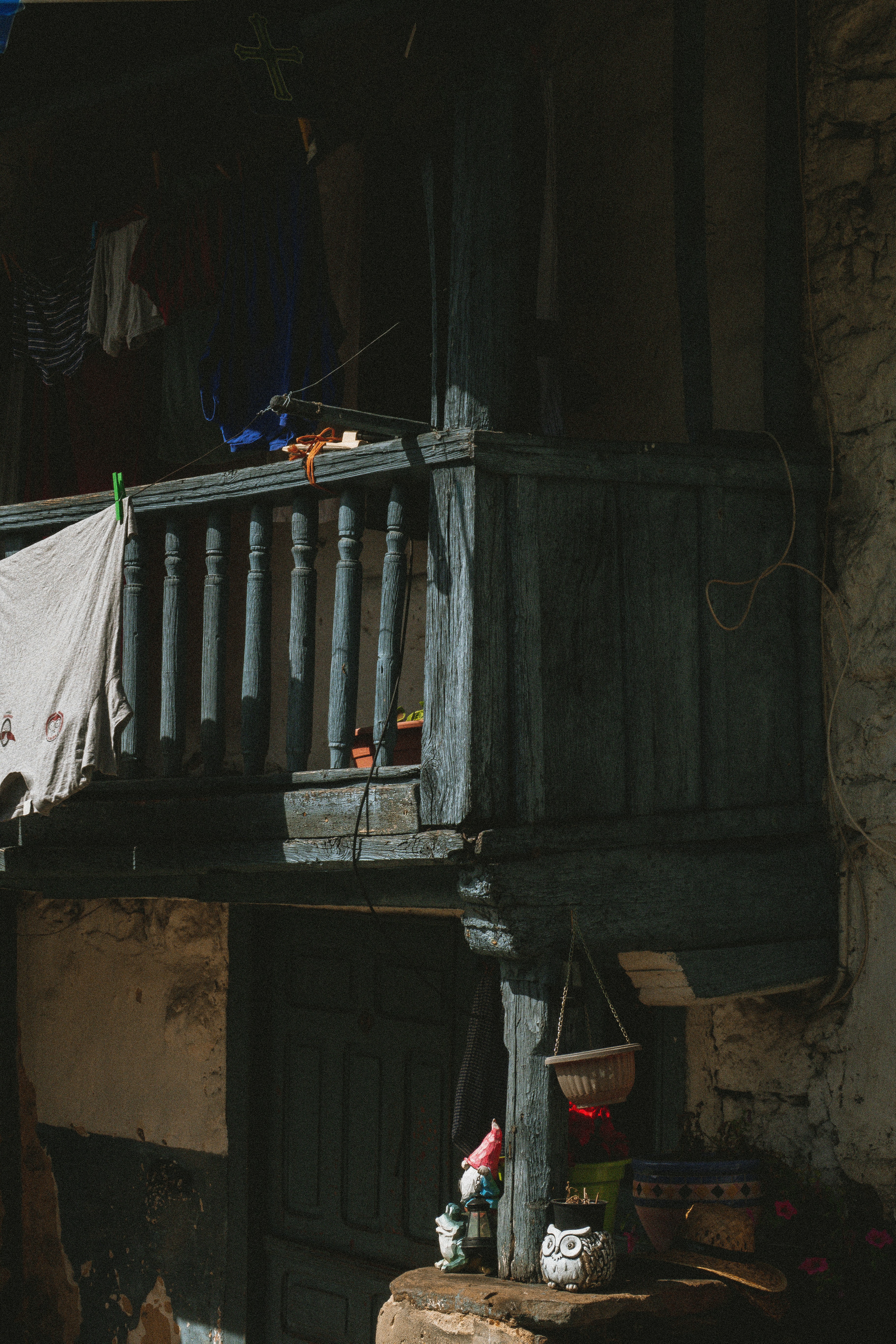 woman wearing yellow long-sleeved dress under white clouds and blue sky during daytime