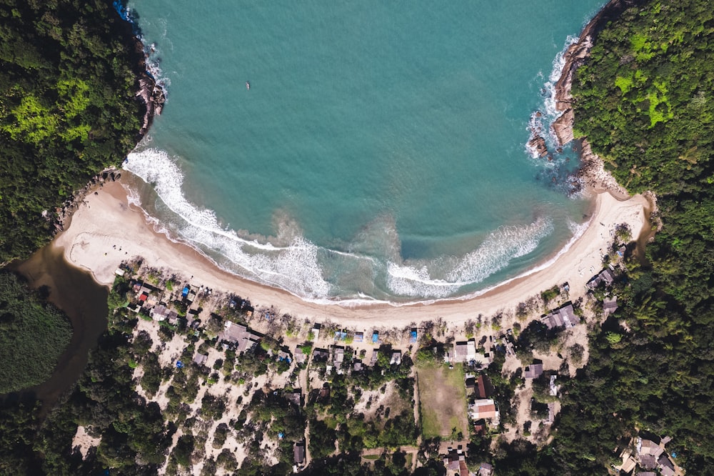 a bird's eye view of a beach and a body of water