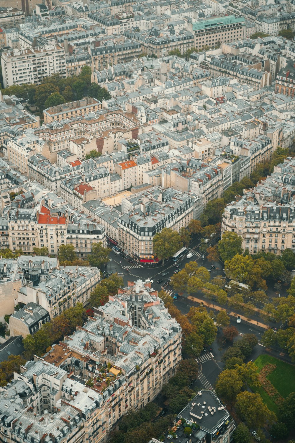 an aerial view of a city with lots of tall buildings