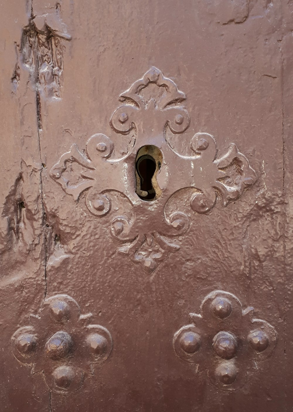 a close up of a door with a keyhole
