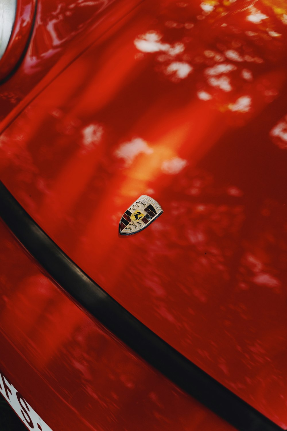 a close up of a red sports car