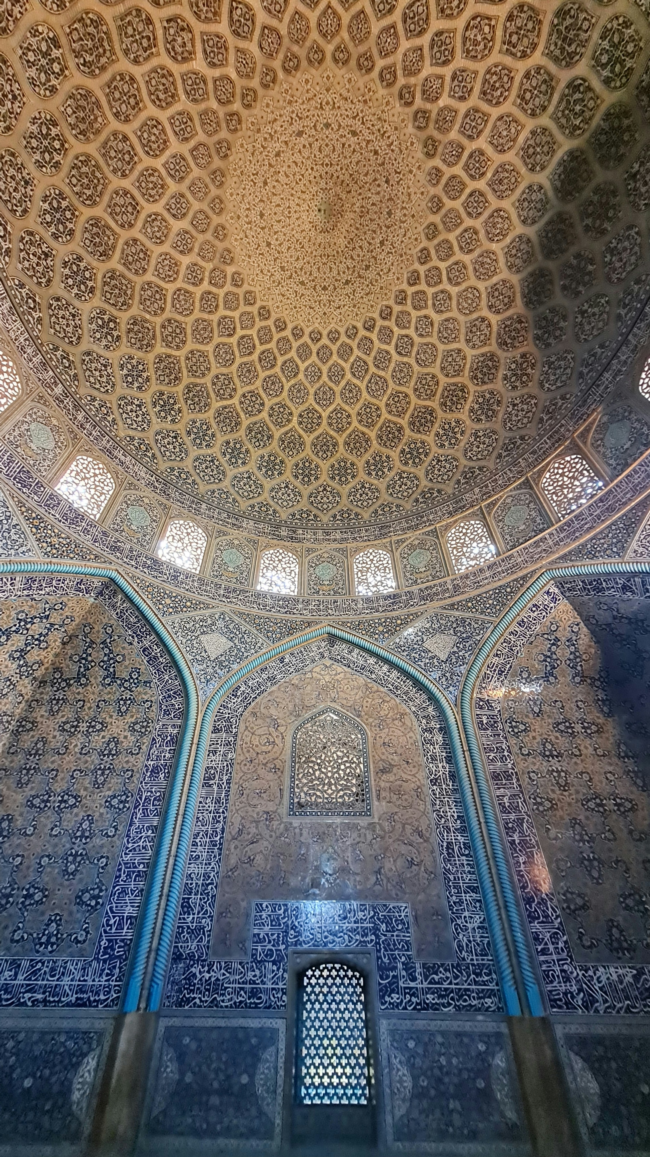 Hassan II Mosque Casablanca grand architecture interior ornate geometric patterns blue gold mosaic tiles