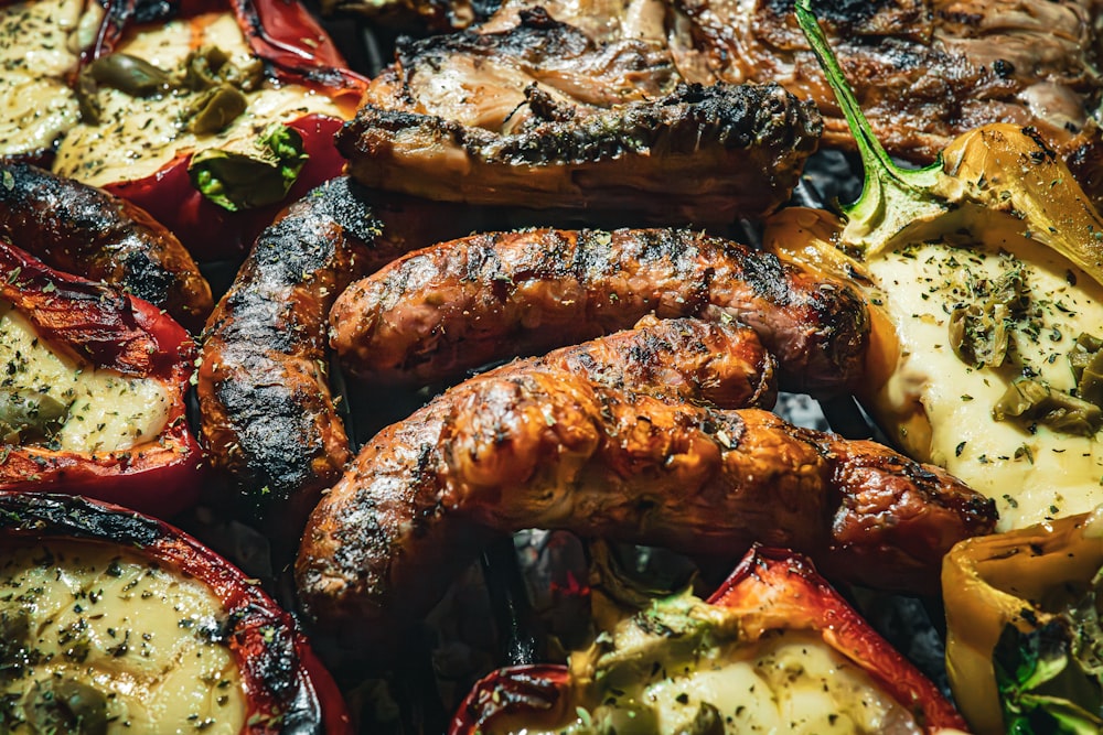 a close up of a bunch of food on a grill