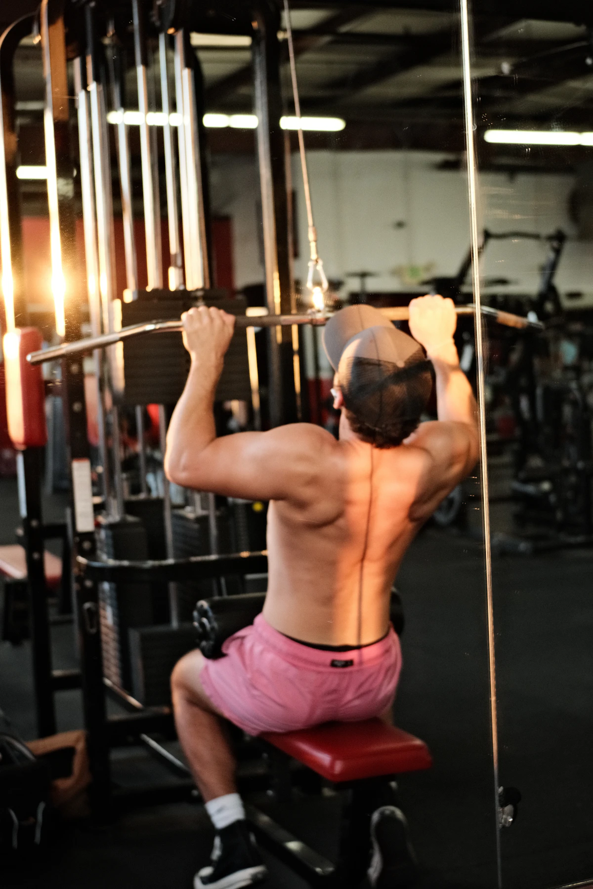 Athlete performing lat pulldown with proper form