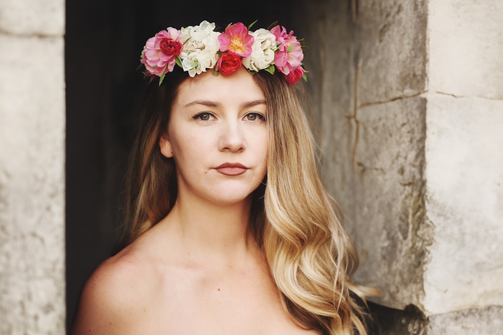 a woman with a flower crown on her head