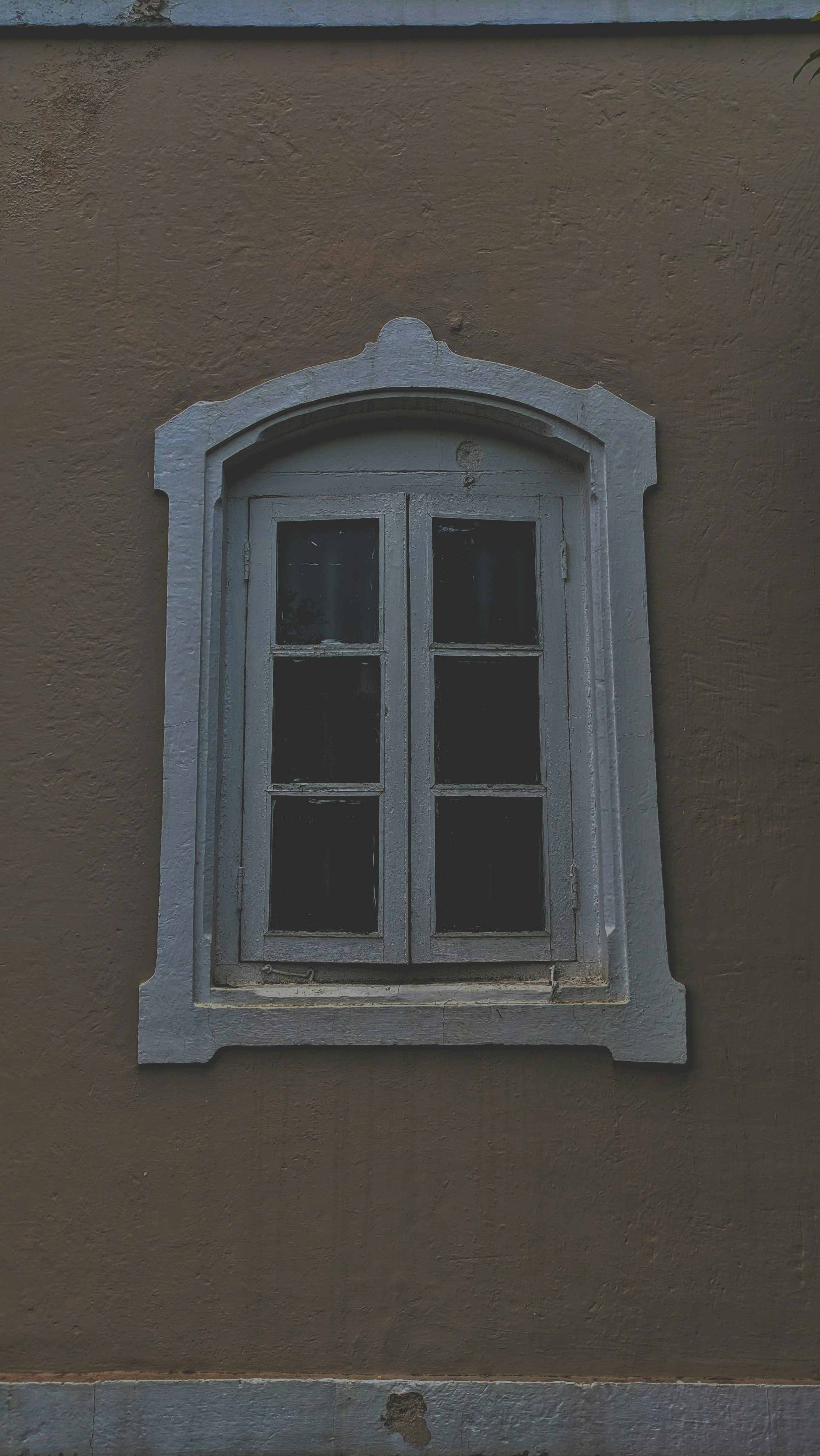 a window on the side of a building