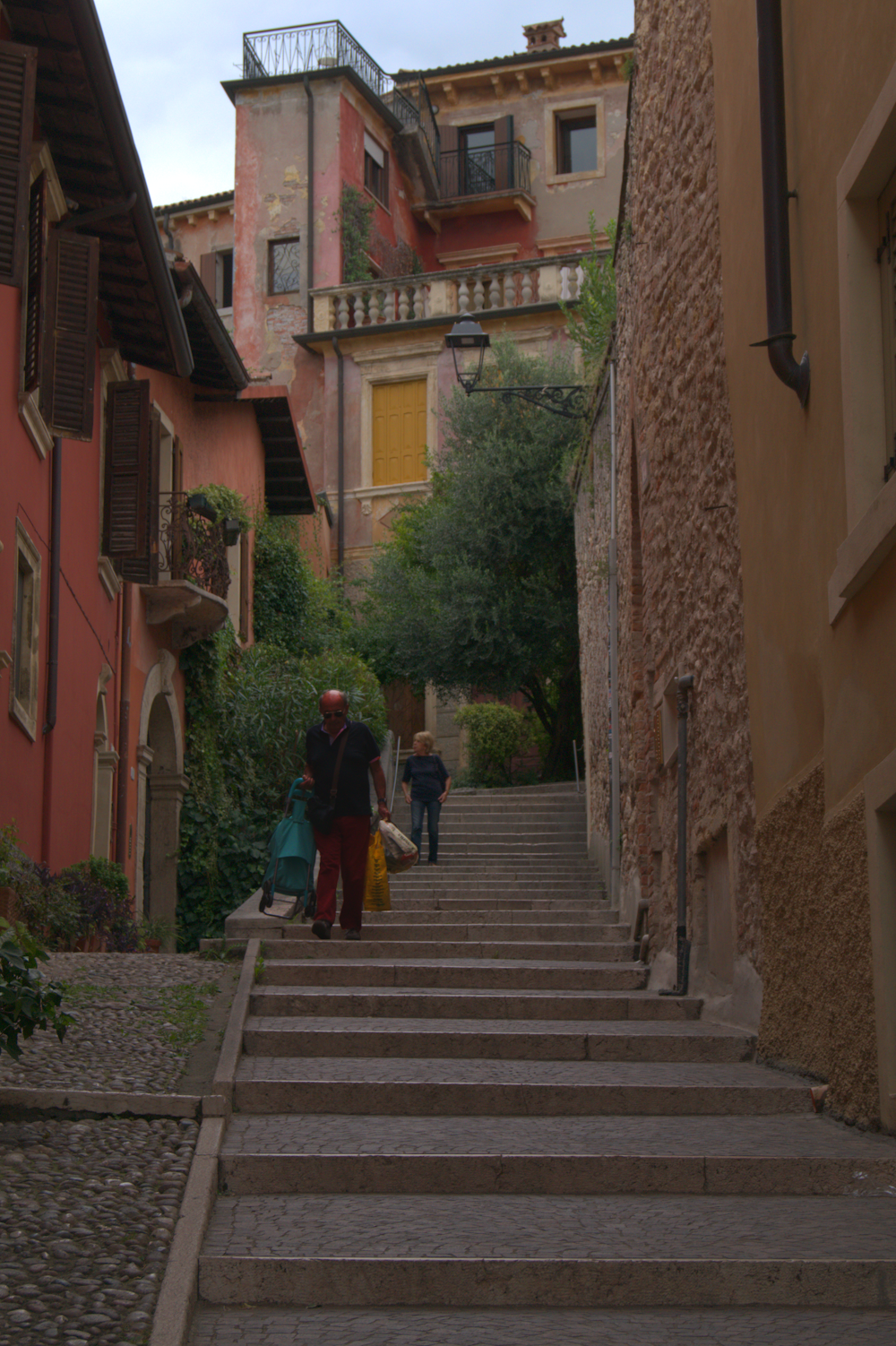 a couple of people that are walking down some stairs