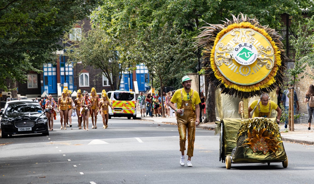 a group of people walking down a street