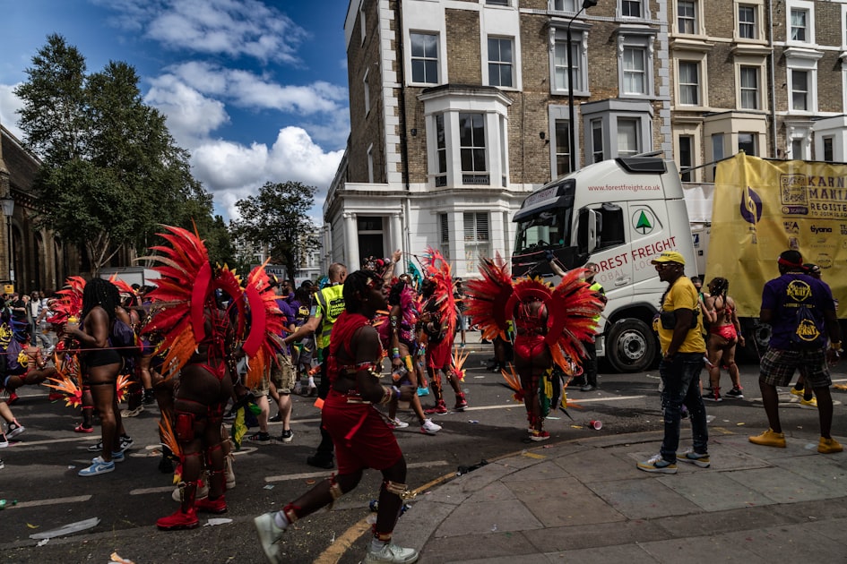 Notting Hill Carnival dancers in colorful costumes