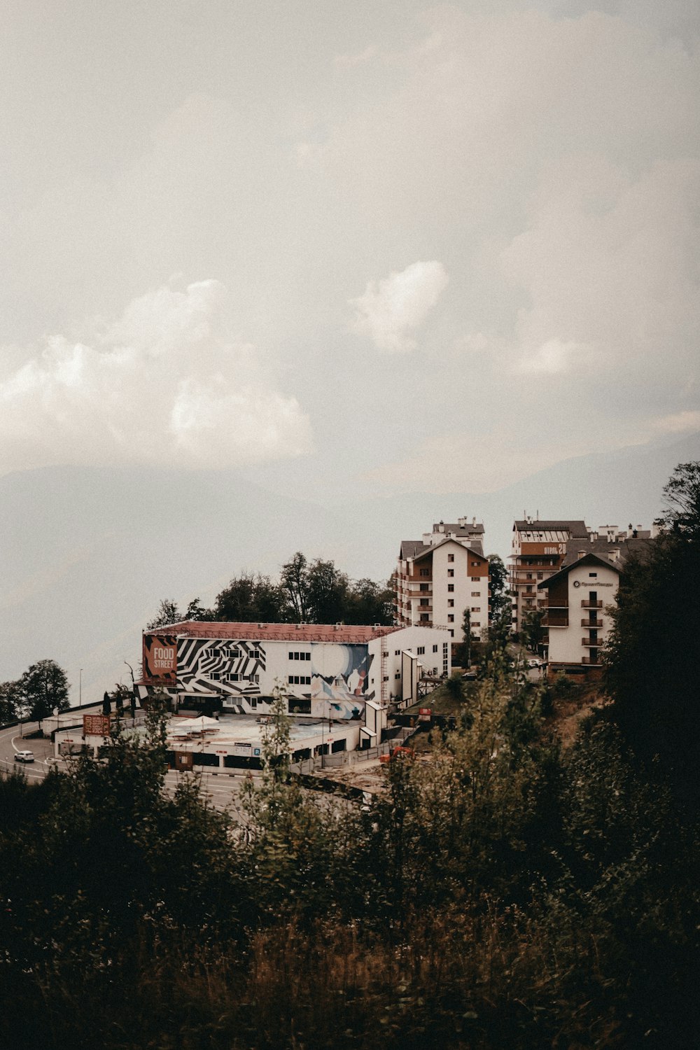 a view of a city from the top of a hill