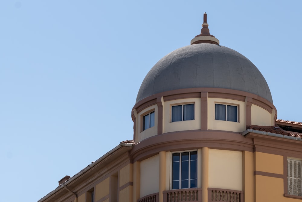 a dome on top of a building with a sky background