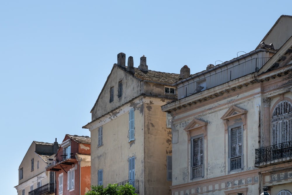 a row of old buildings in a city