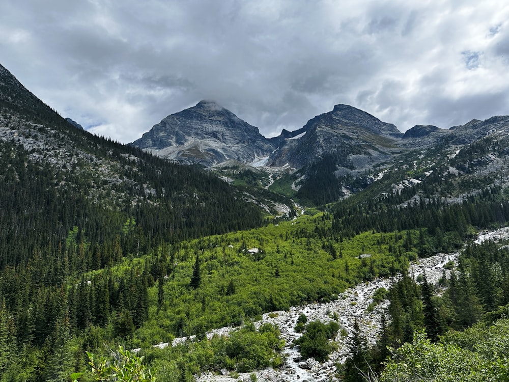 a view of a mountain range with a river running through it