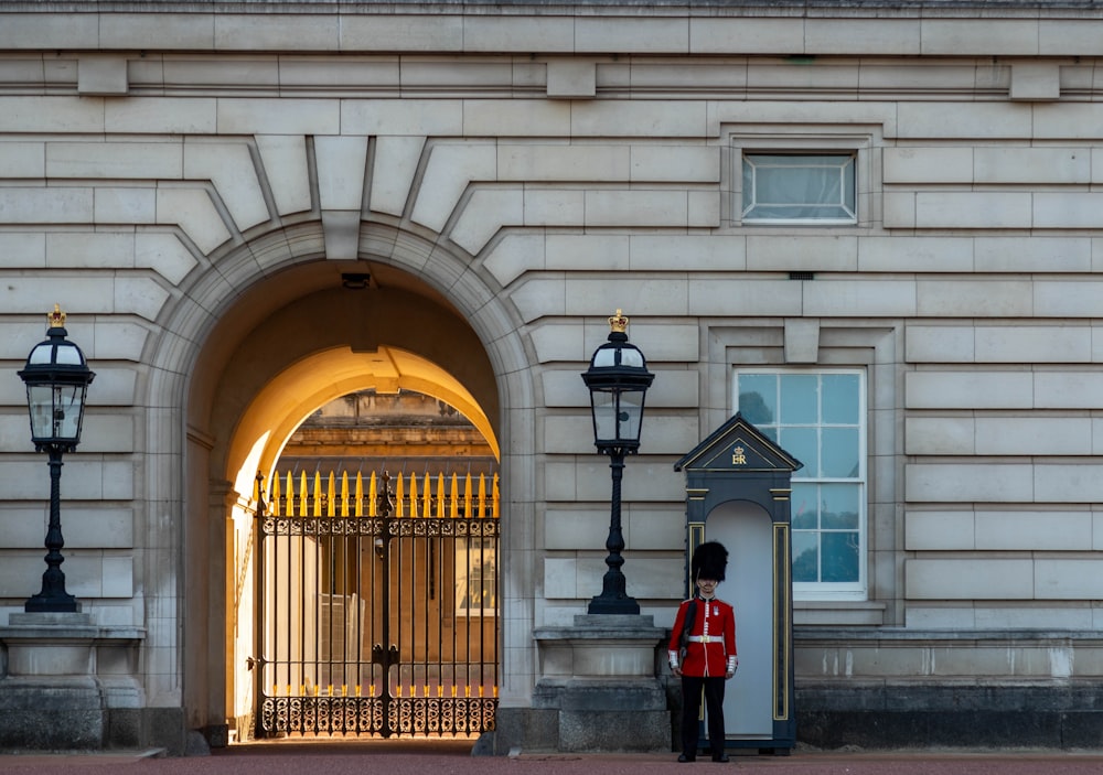 a guard standing in front of a building