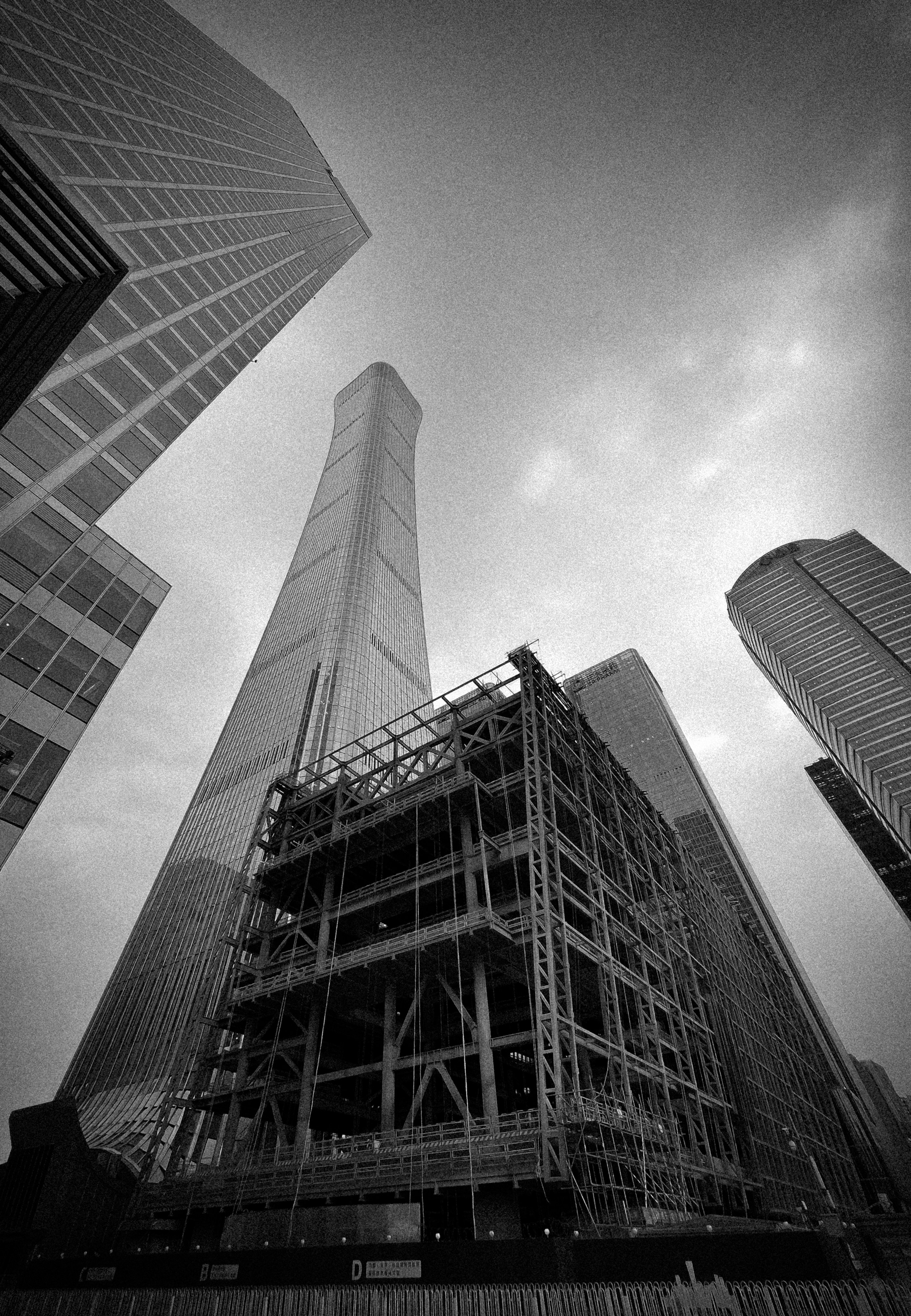 a black and white photo of a tall building