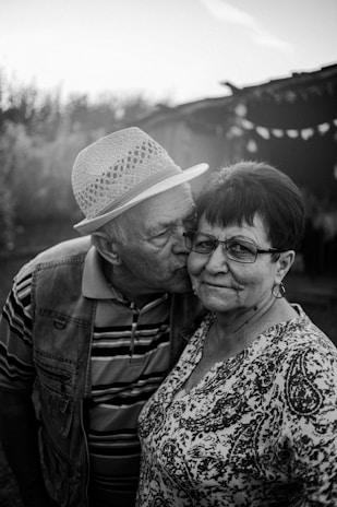 a man and a woman standing next to each other