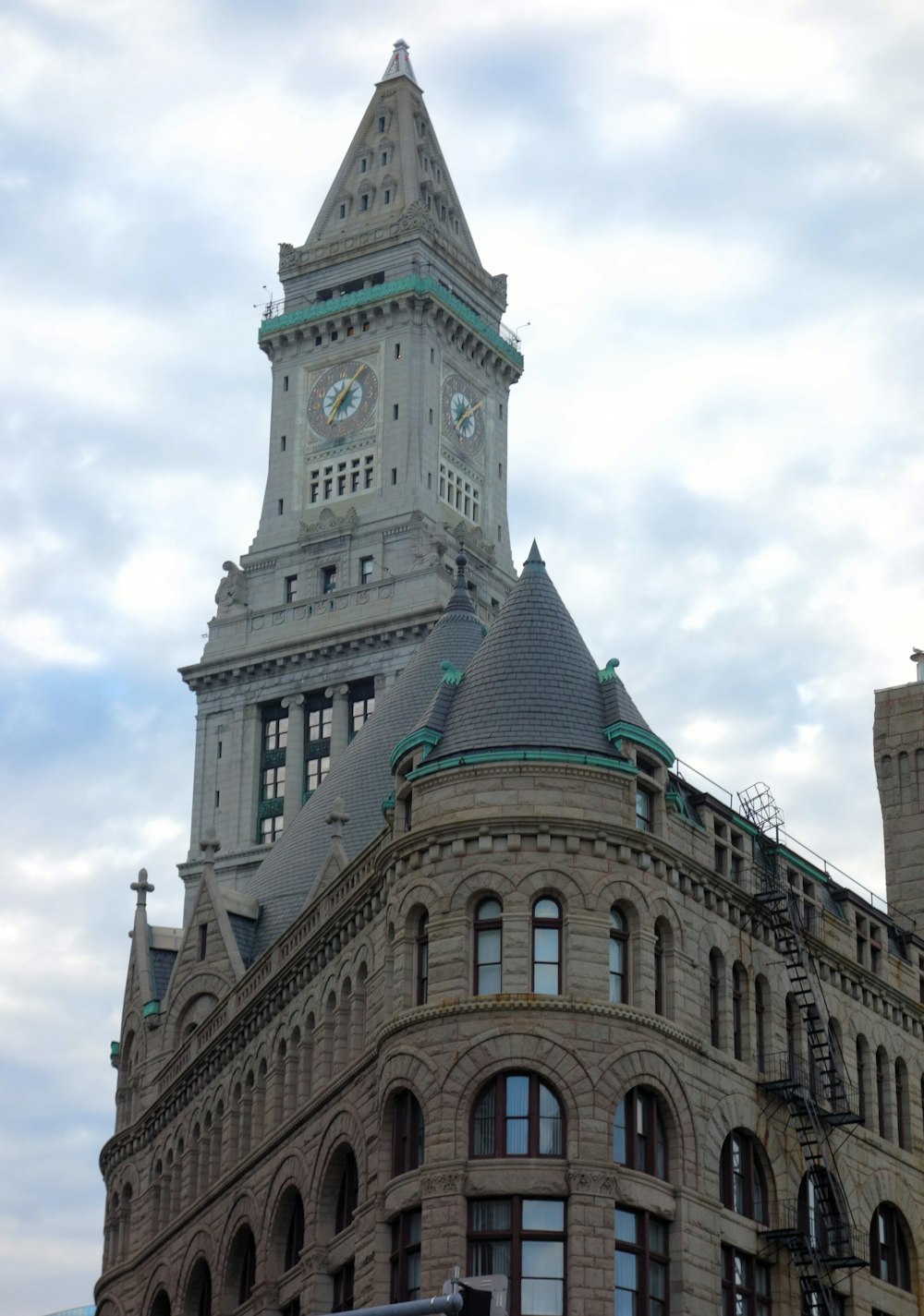 a very tall building with a clock on the top