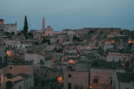 A scenic view of a historic English town with cobblestone streets and old buildings.