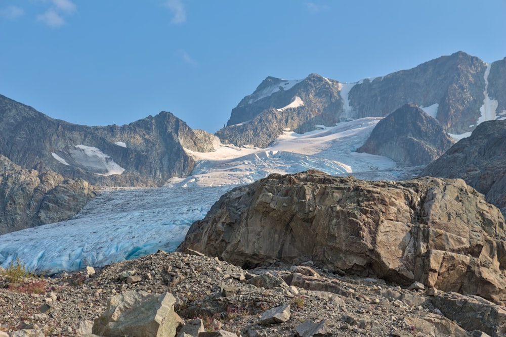 a mountain with a glacier in the background