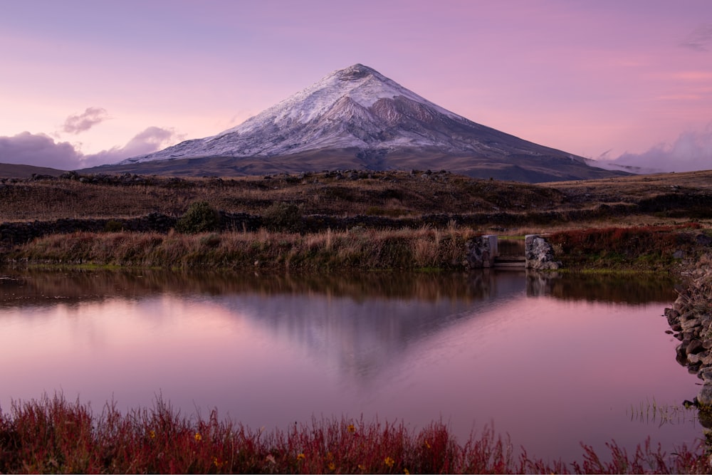 a mountain with a lake in front of it