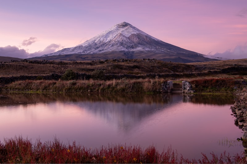 a mountain with a lake in front of it