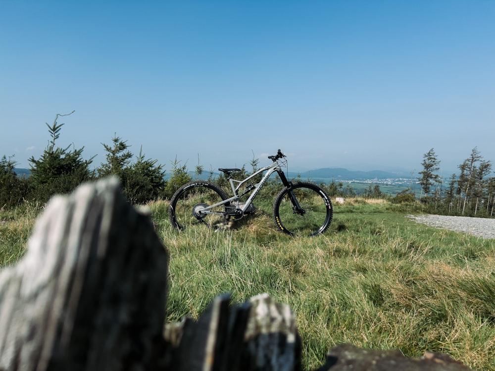 a bike that is sitting in the grass