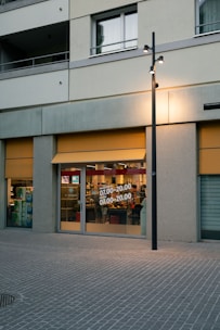 Commercial storefront with large windows and signage