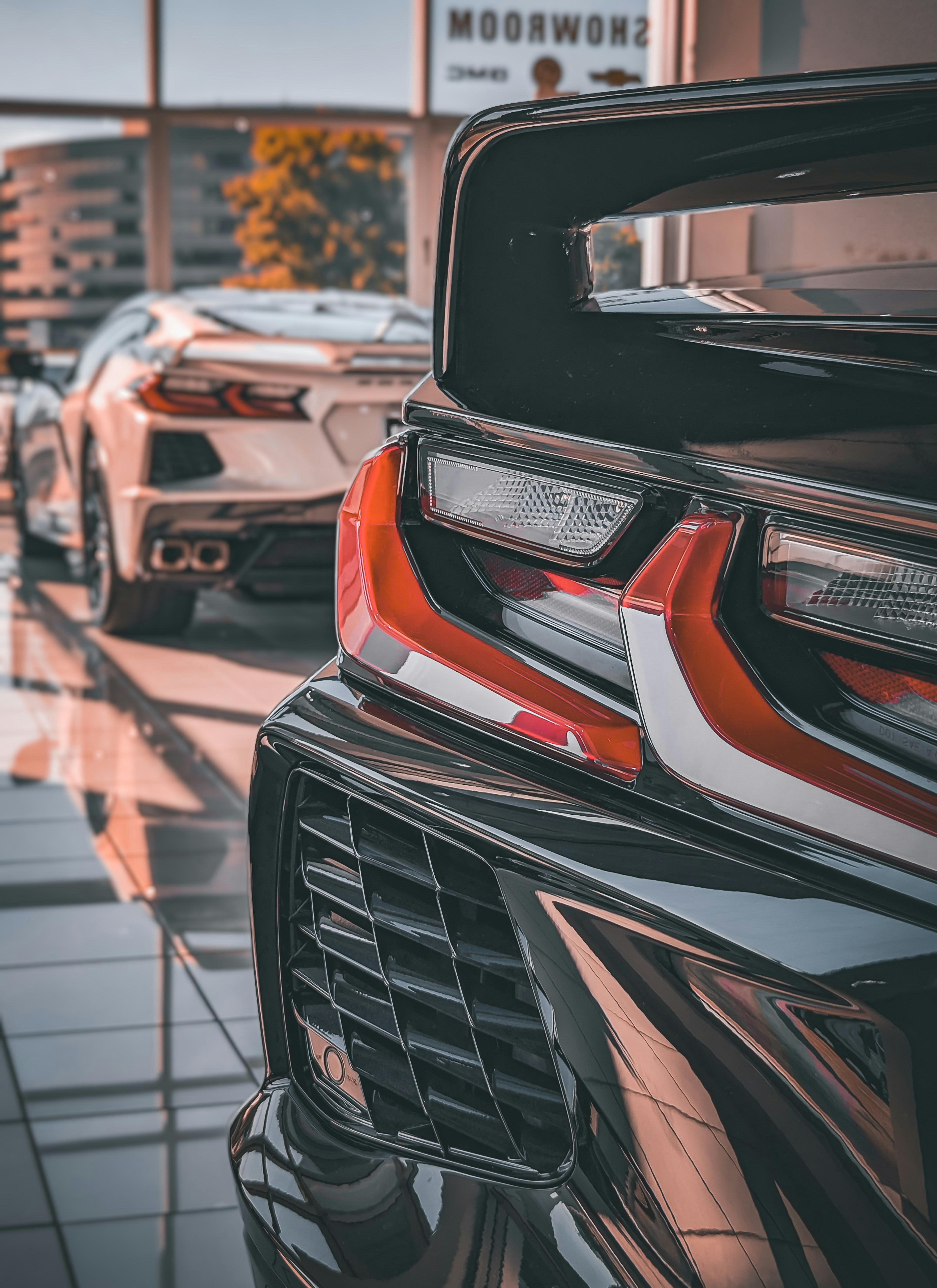 a couple of cars parked next to each other