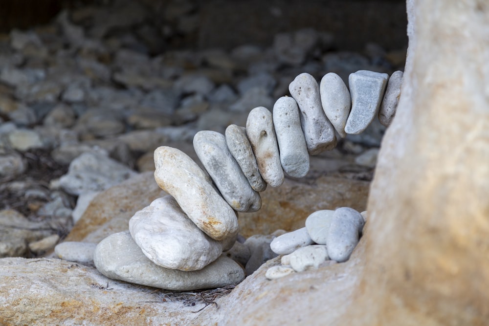 a pile of rocks sitting on top of a pile of rocks