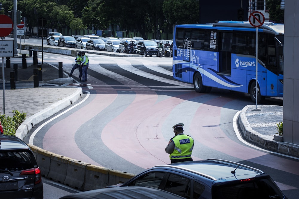 a police officer directing traffic on a city street