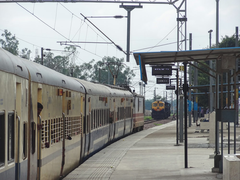 a train on a train track next to a platform