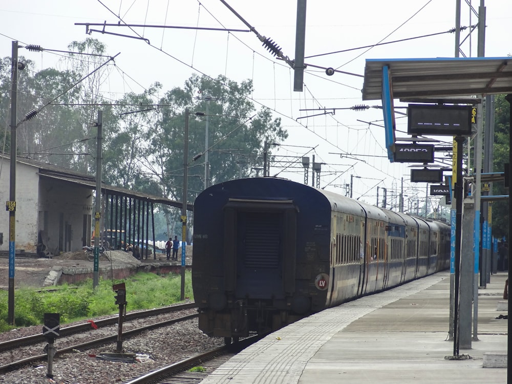 a train on the tracks at a train station