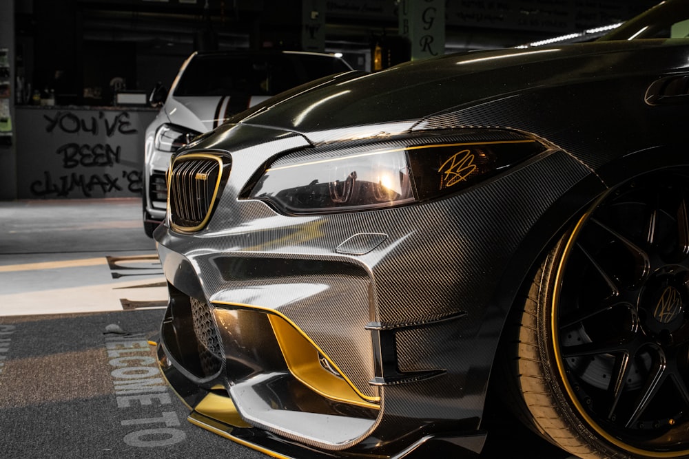 a close up of a car parked in a garage