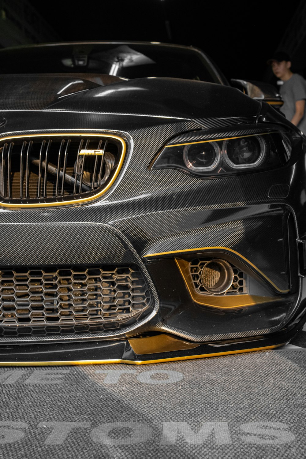 a close up of the front of a sports car