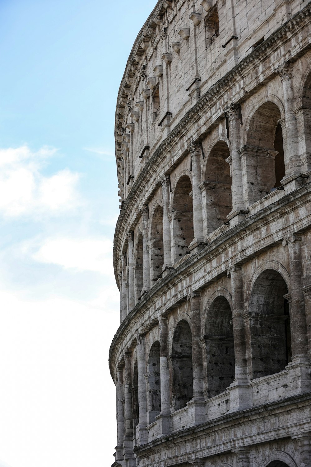 a close up of the side of an ancient building