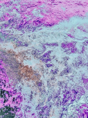 An abstract visual art piece created by Axel Krygier blending colors and textures.