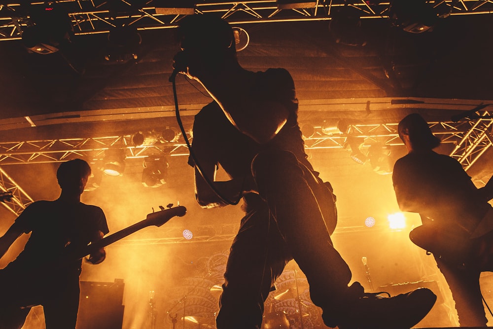 a group of people that are standing on a stage