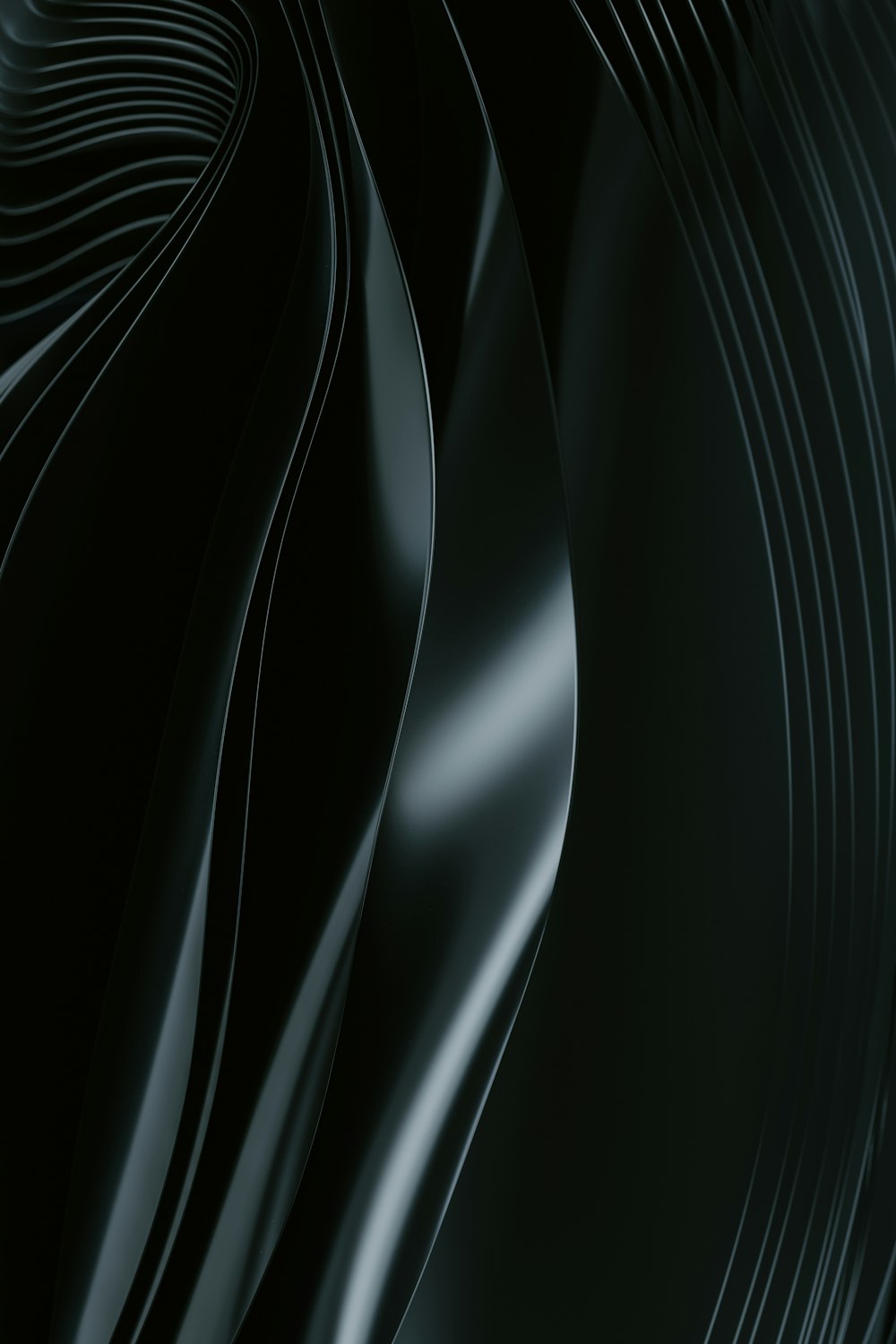 a close up of a black background with wavy lines