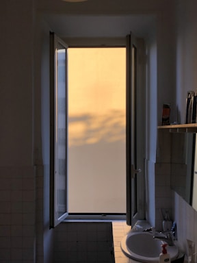 Cozy studio entrance bathed in warm afternoon light.