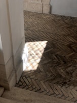 Bright kitchen featuring a durable vinyl floor with a subtle stone pattern.