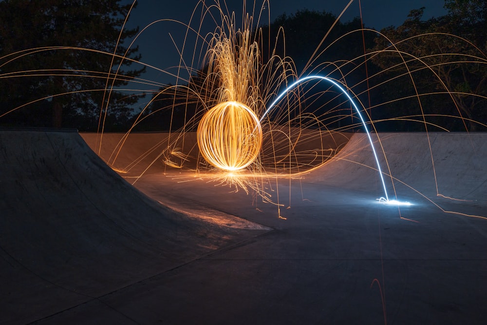 a person riding a skateboard at night