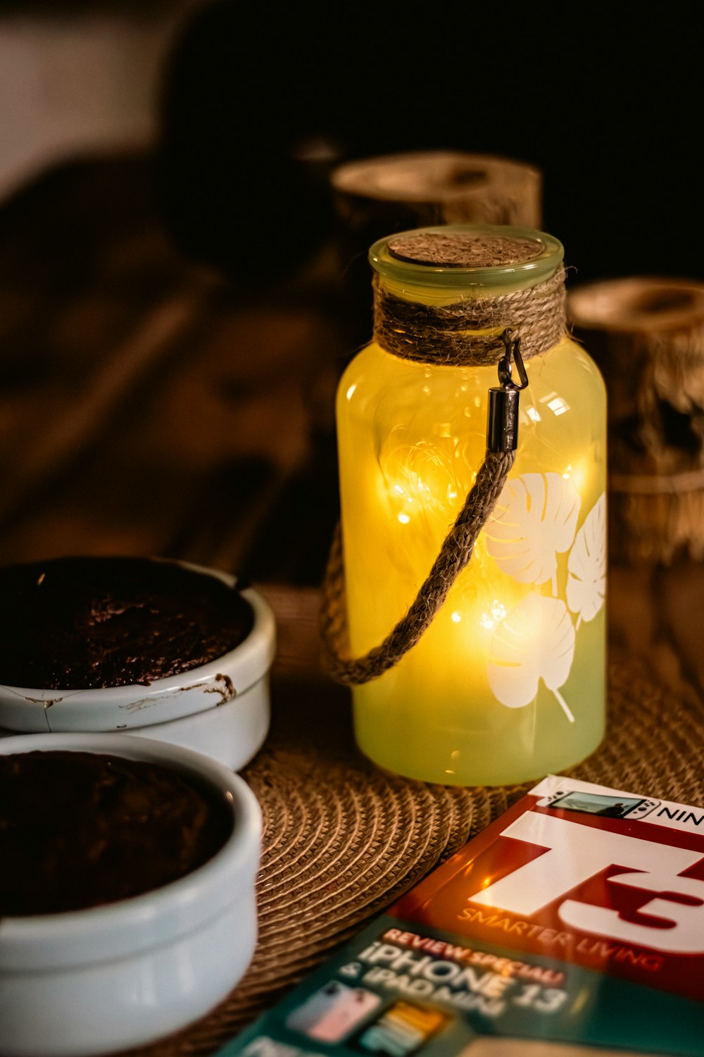 a mason jar with a string of lights in it