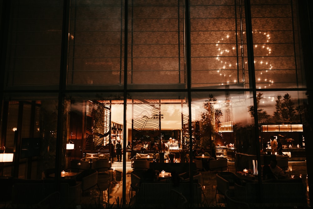 the reflection of a building in a window at night