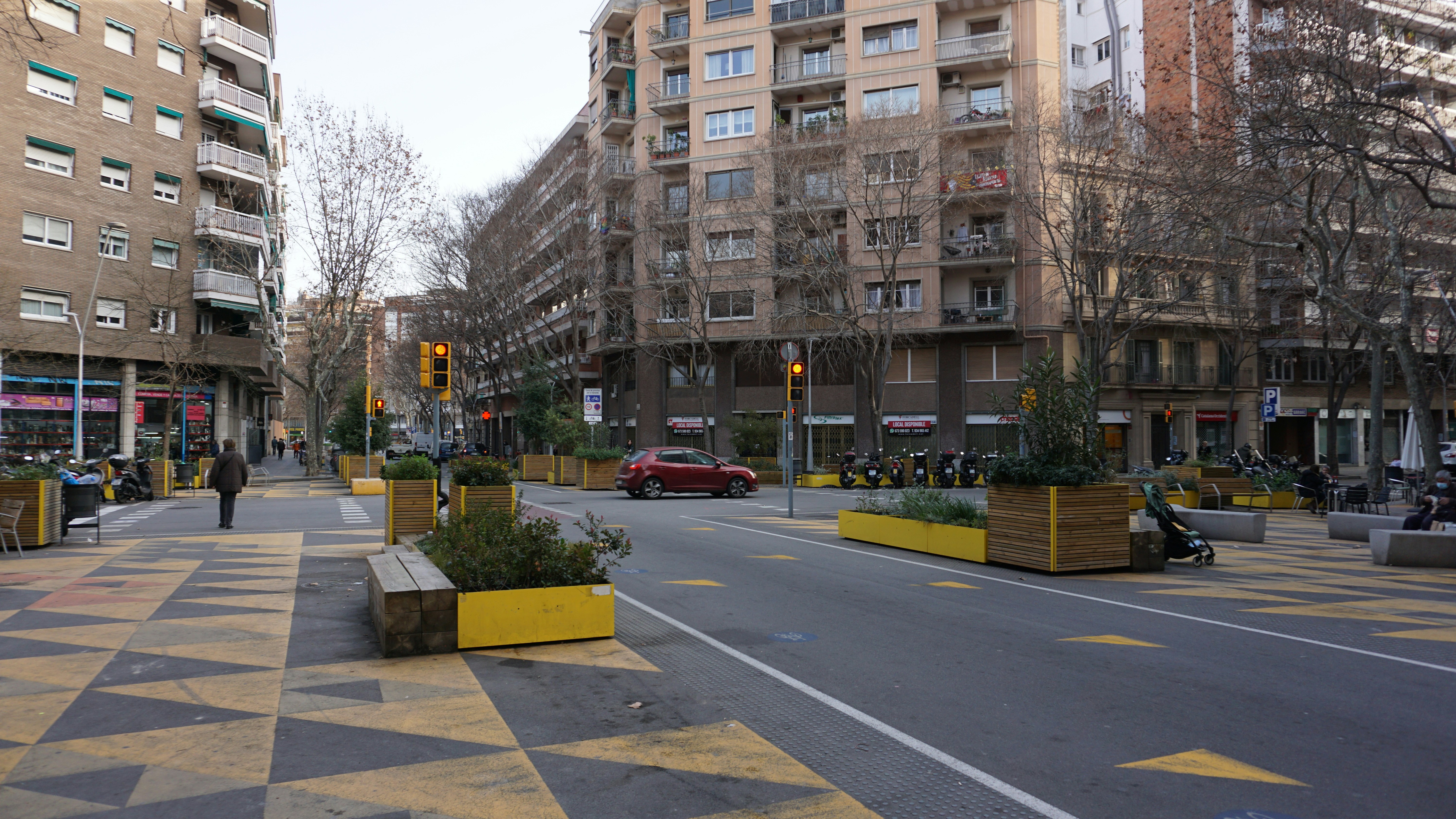 a city street filled with lots of tall buildings