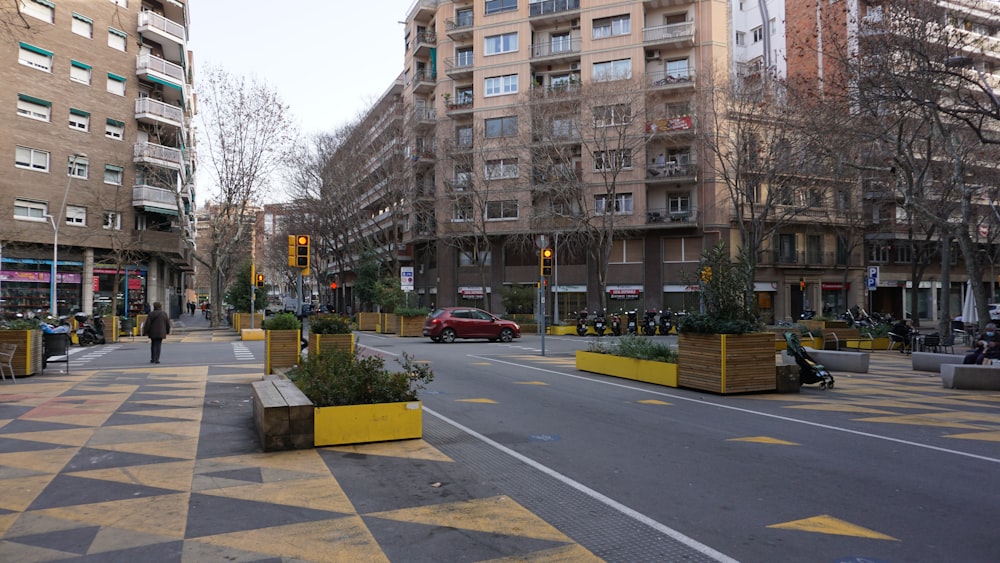 a city street filled with lots of tall buildings