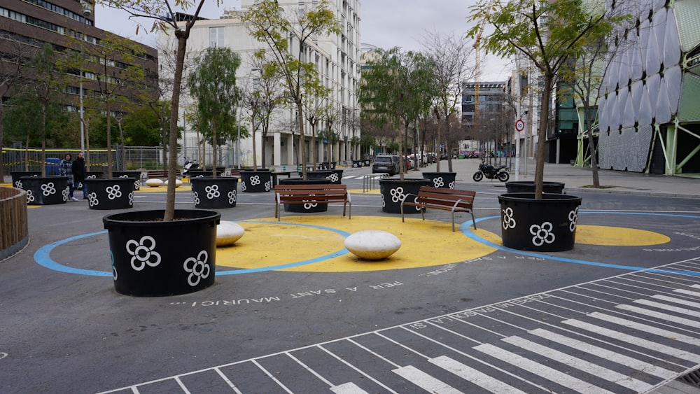 a group of benches sitting in the middle of a park