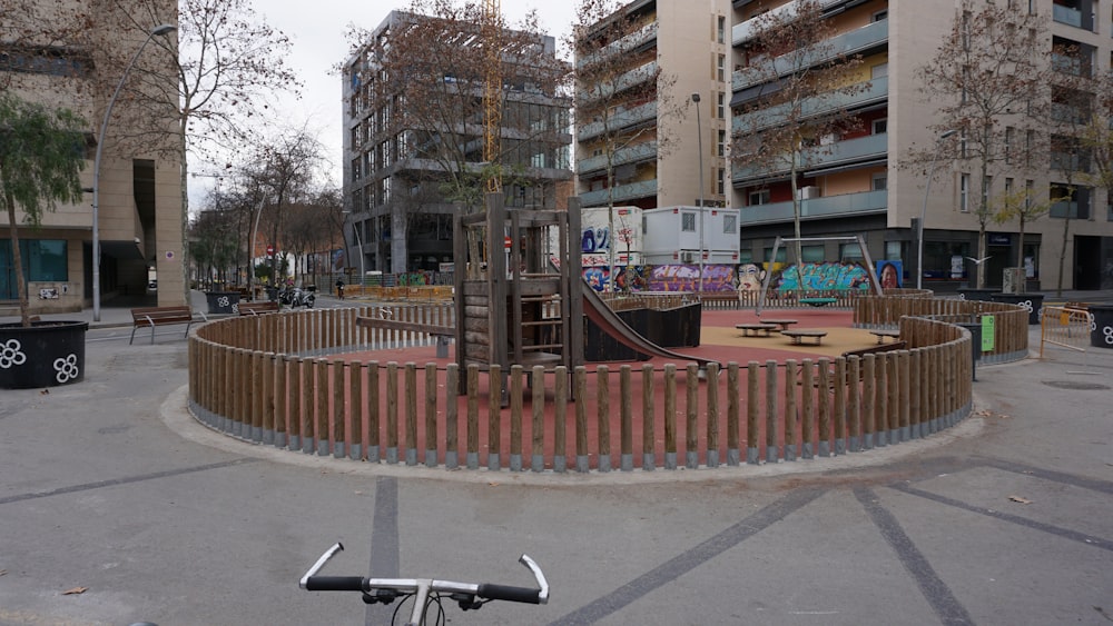 a bike is parked in the middle of a park