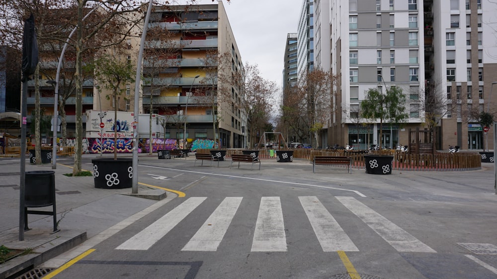 a city street with a lot of tall buildings