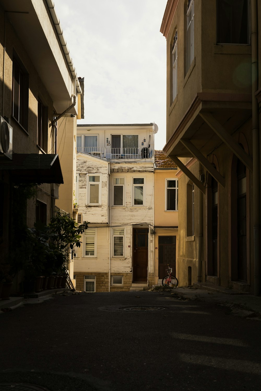 an empty street in a city with a few buildings